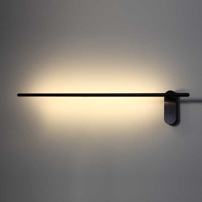Black interior wall light set to horizontal position on  grey wall