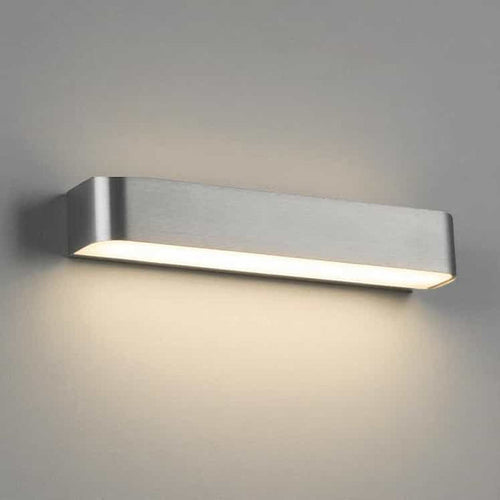 Silver up down sconce indoor on a grey background