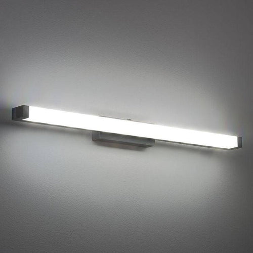 black modern bathroom light above mirror mounted on a grey wall