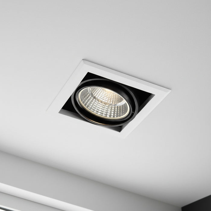 commercial downlights mounted in the ceiling in a showroom