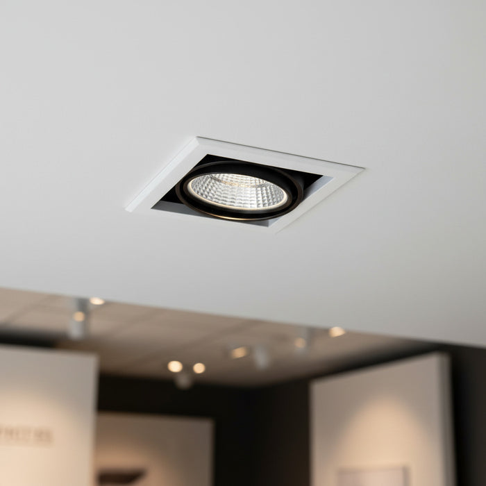 commercial downlighter installed into the ceiling in a hotel reception