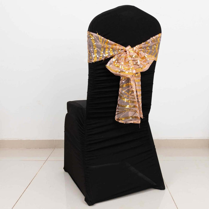 Black chair cover with gold sequined bow, elegant event decoration.