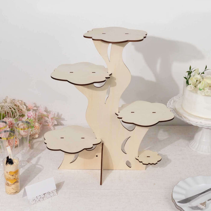 Wooden tree-shaped dessert stand with four tiers for displays.