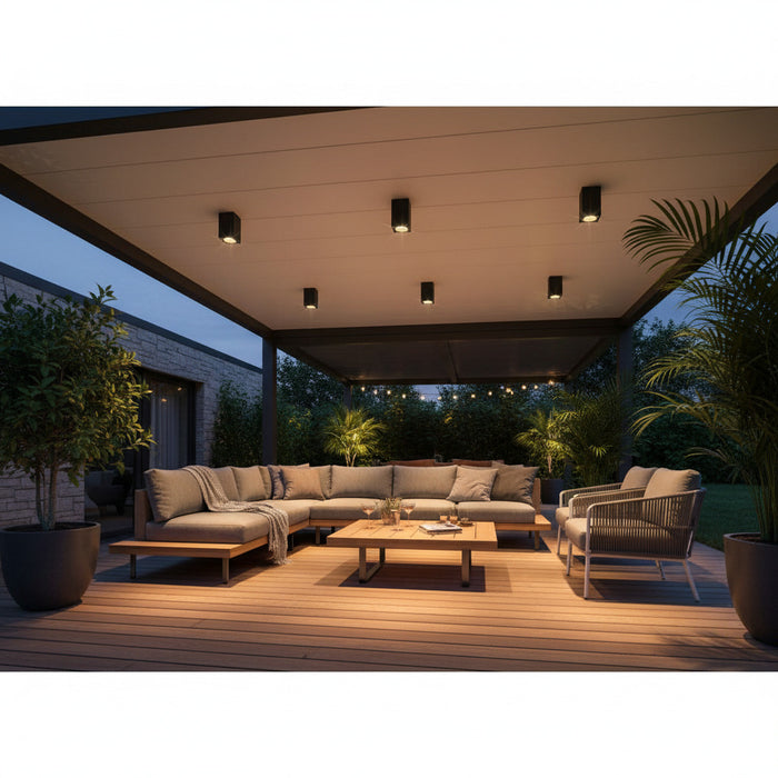black surface mount exterior soffit light mounted over an outside entertaining area.