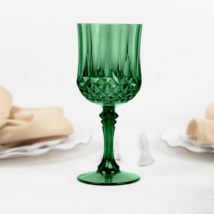 Green crystal goblet on a table setting