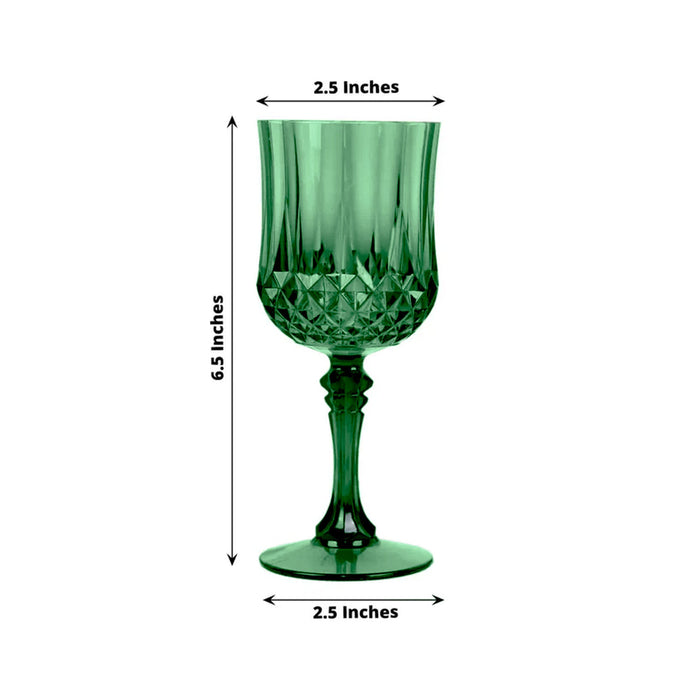 Green crystal goblet with decorative pattern, 2.5 inches wide and 6.5 inches tall.