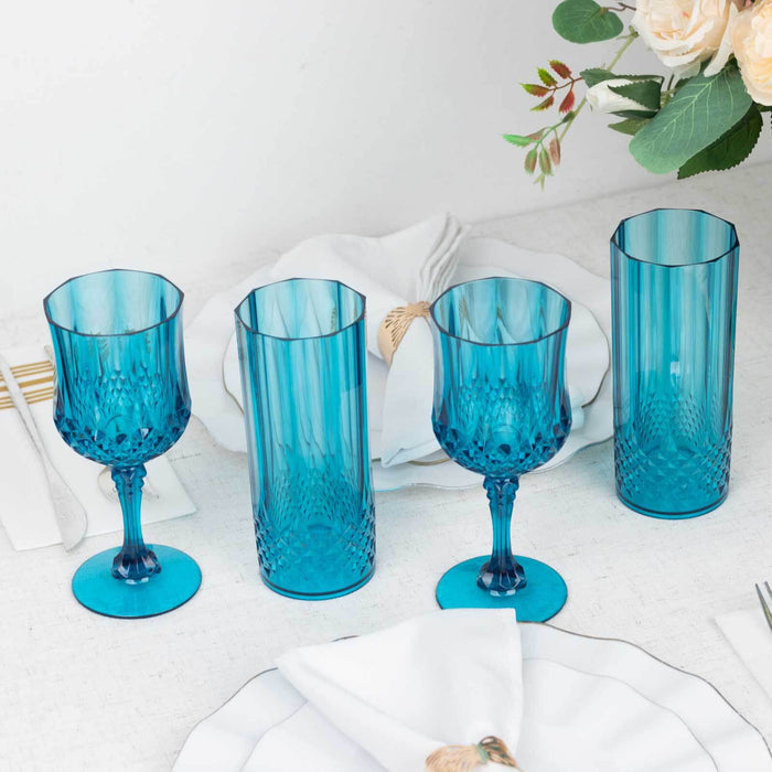 Set of four elegant blue glassware pieces on a dining table.