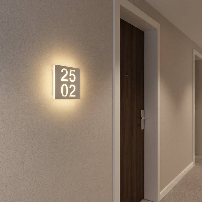 LED Hotel room door number mounted next to a hotel door