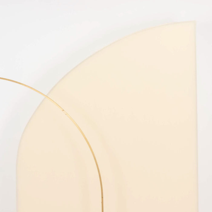 Abstract beige sculpture with a curved design.