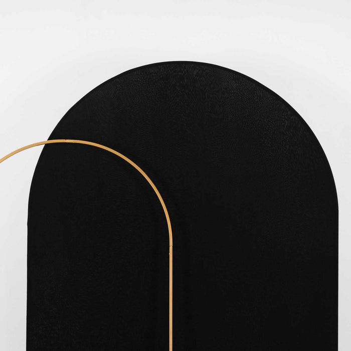 Black and gold minimalist wall decor piece on a white background