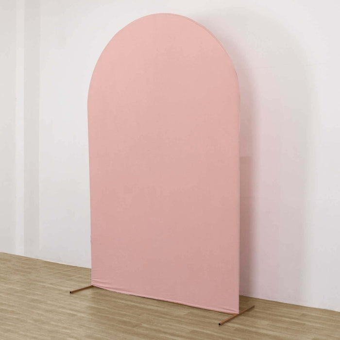 Pink fabric backdrop with an arched top for photography.