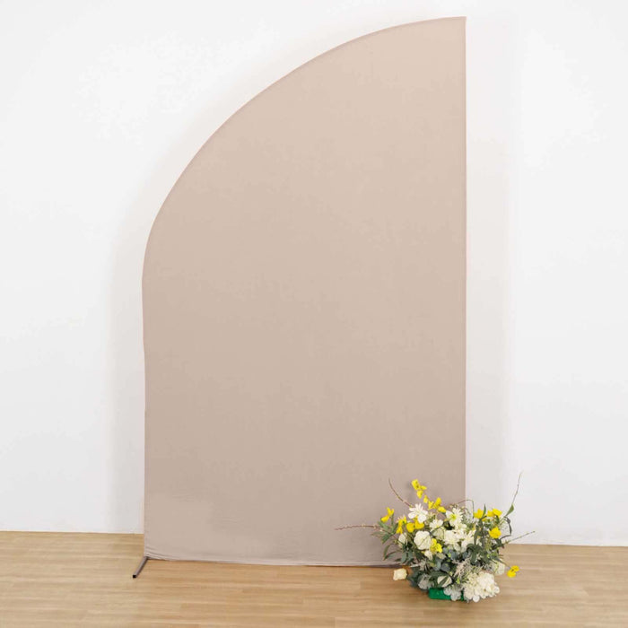 Beige fabric backdrop with decorative flowers in front