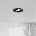 black bathroom downlight fitted in a modern bathroom ceiling