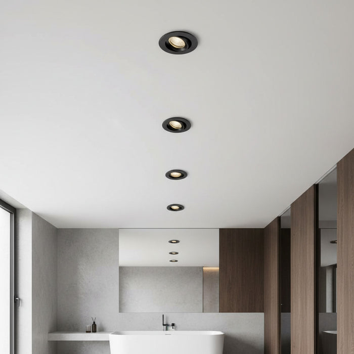 black bathroom downlight mounted in a modern bathroom