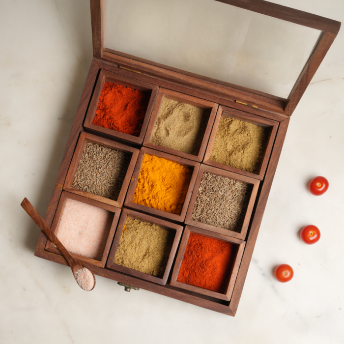 Sheesham Wood Masala Box 9 Compartments by Intaryaa - styled with spices