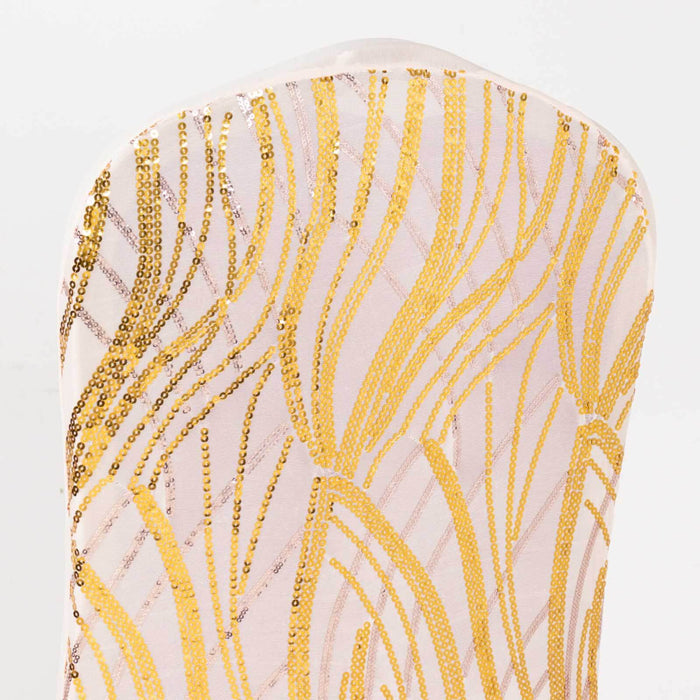Gold sequined fabric with flowing pattern on a soft pink background.