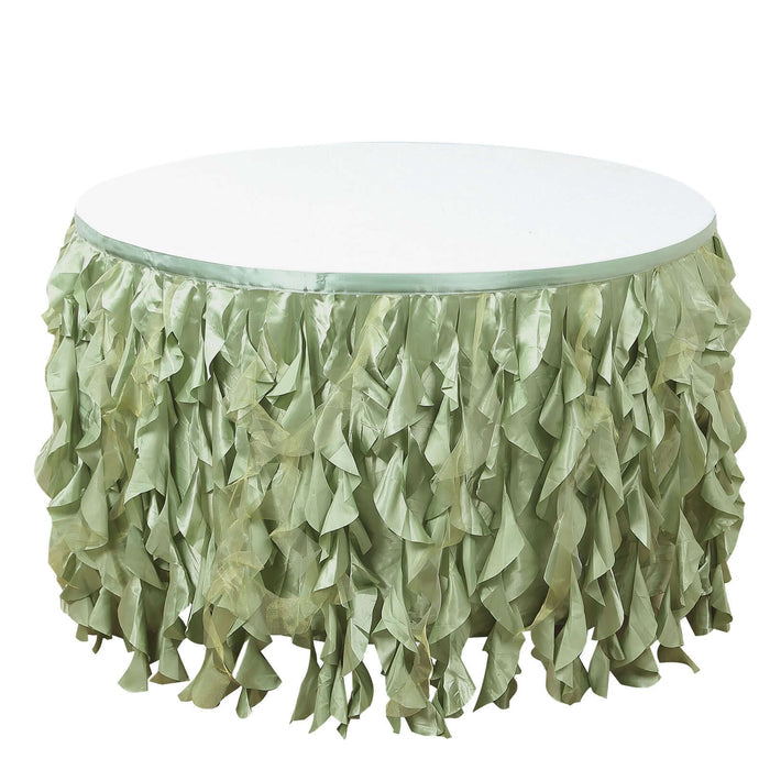 Round table with green satin ruffled skirt