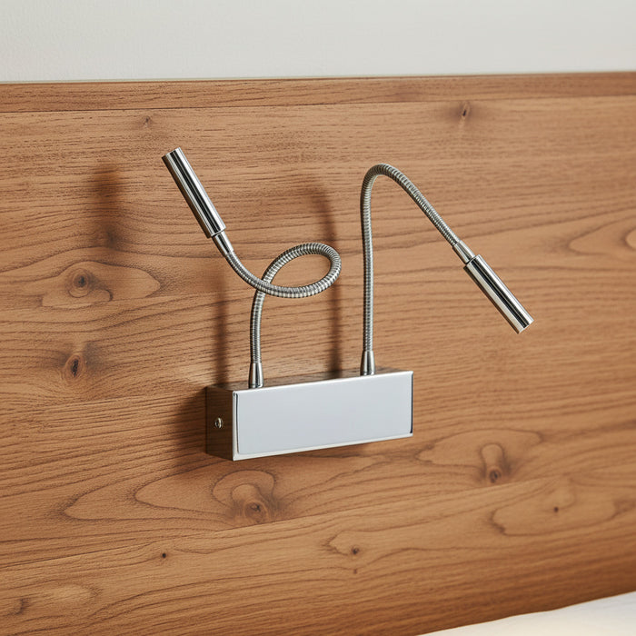 chrome overbed reading light mounted on a wood bed headboard